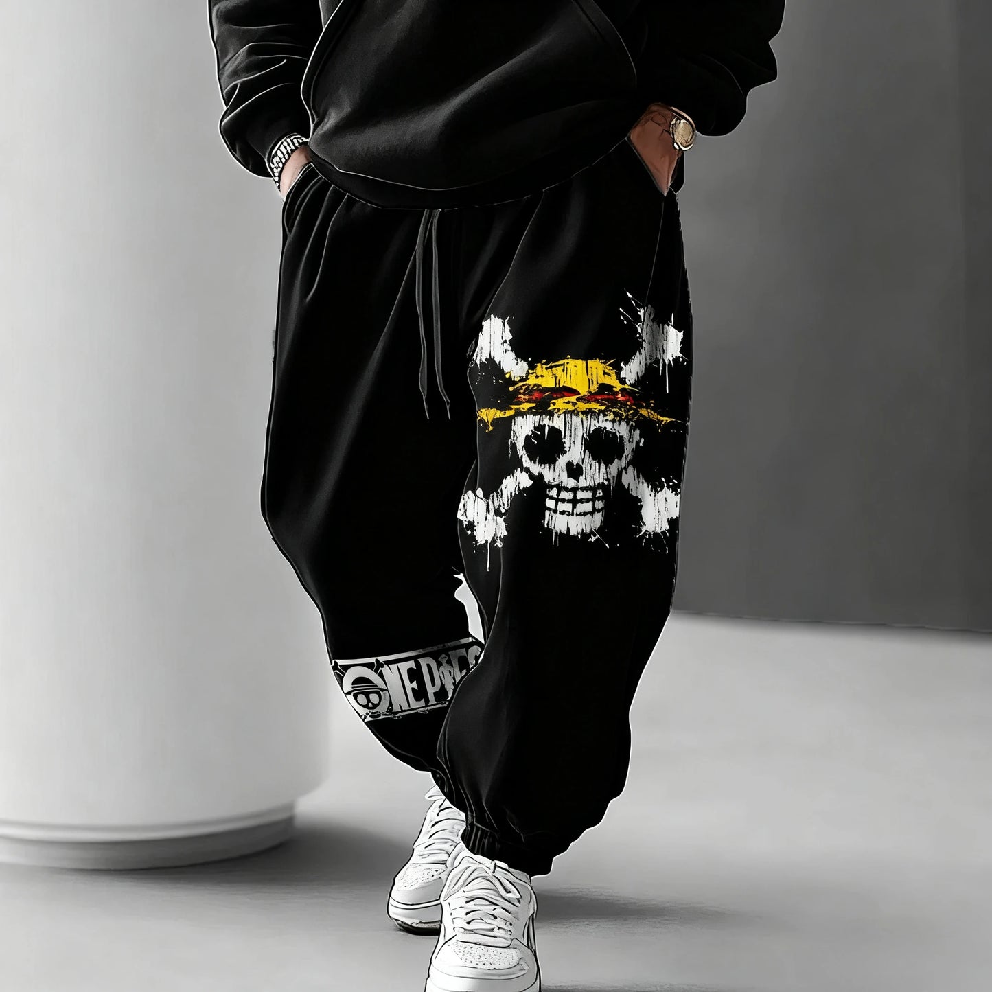 Spodnie dresowe One Piece – Jolly Roger załogi Mugiwara (biały na czarnym tle)